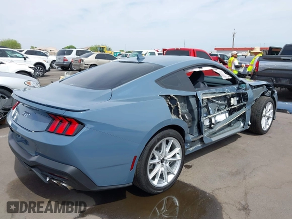 2024 Ford Mustang GT with VIN 1FA6P8CF5R5407998, listed as a IAAI auction lot 42228052 with 12,863 mi miles and . Bid and sale history available at DreamBid. Image 6.
