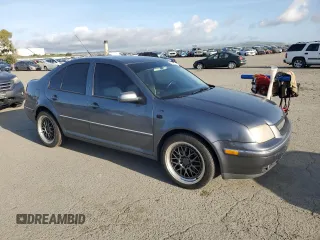 2004 Volkswagen Jetta GLS with VIN 3VWSE69M64M020143, listed as a Copart auction lot 52111795 with 175,088 mi miles and Salvage title. Bid and sale history available at DreamBid. Image 4.