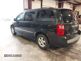 2010 Dodge Grand Caravan SXT with VIN 2D4RN5D19AR433481, listed as a IAAI auction lot 42123049 with 134,882 mi miles and . Bid and sale history available at DreamBid. Image 3.