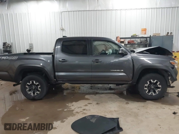 2021 Toyota Tacoma SR z VIN 5TFCZ5AN1MX268854, wystawiony jako IAAI lot #41608266 z przebiegiem 45 823 mil mil oraz . Historia ofert i sprzedaży dostępna na DreamBid. Obrazek 14.