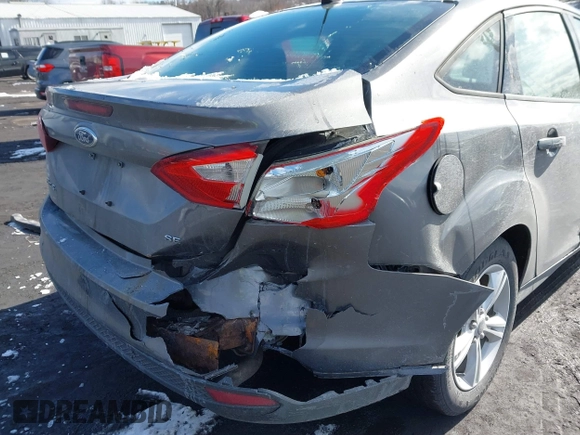 2013 Ford Focus SE with VIN 1FADP3F24DL288221, listed as a IAAI auction lot 41646815 with 169,617 mi miles. Bid and sale history available at carsss.com. Image 6.