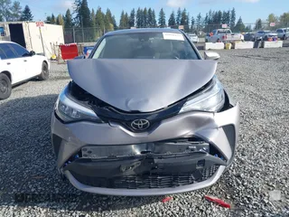 2020 Toyota C-HR LE z VIN JTNKHMBXXL1077939, wystawiony jako IAAI lot #42044122 z przebiegiem 47 140 mil mil oraz . Historia ofert i sprzedaży dostępna na DreamBid. Obrazek 12.
