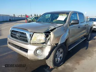 2005 Toyota Tacoma PreRunner with VIN 3TMKU72N55M003169, listed as a IAAI auction lot 41337937 with 142,474 mi miles. Bid and sale history available at carsss.com. Image 2.