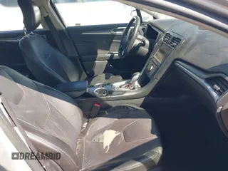2014 Ford Fusion Titanium Hybrid with VIN 3FA6P0RUXER103516, listed as a IAAI auction lot 42004602 with 128,287 mi miles and . Bid and sale history available at carsss.com. Image 5.