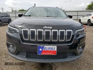 2019 Jeep Cherokee Latitude with VIN 1C4PJLCB6KD264183, listed as a Copart auction lot 64871745 with 121,556 mi miles and Salvage title. Bid and sale history available at DreamBid. Image 5.