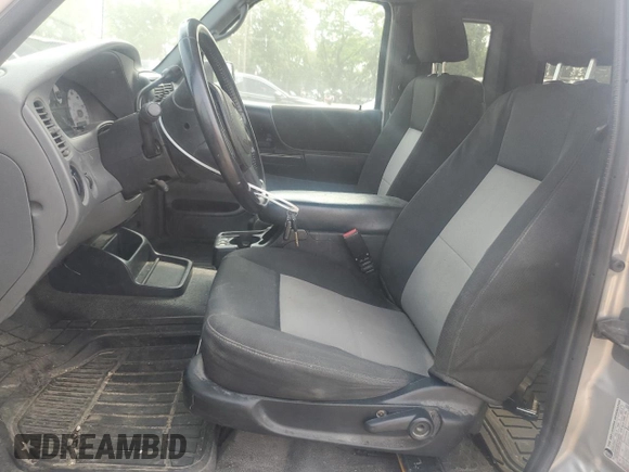 2010 Ford Ranger XLT z VIN 1FTLR4FE7APA30795, wystawiony jako Copart lot #59585595 z przebiegiem 161 414 mil mil oraz Szkoda całkowita • Salvage title. Historia ofert i sprzedaży dostępna na DreamBid. Obrazek 7.
