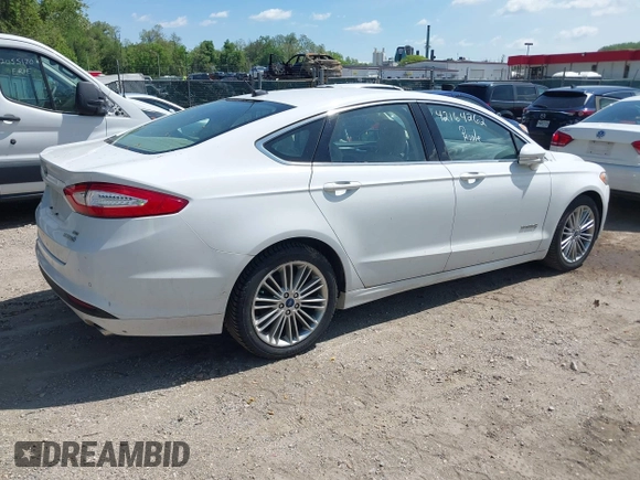 2013 Ford Fusion SE Hybrid with VIN 3FA6P0LU4DR337674, listed as a IAAI auction lot 42164262 with 150,902 mi miles and . Bid and sale history available at carsss.com. Image 4.