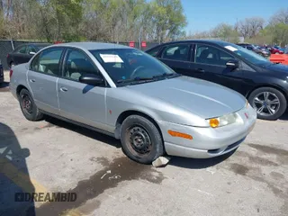 2002 Saturn SL with VIN 1G8ZK527X2Z247253, listed as a IAAI auction lot 41979342 with 155,185 mi miles. Bid and sale history available at carsss.com. Image 1.