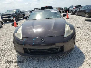 2013 Nissan 370Z Touring z VIN JN1AZ4EH0DM380992, wystawiony jako Copart lot #52194335 z przebiegiem 73 764 mil mil oraz Szkoda całkowita • Salvage title. Historia ofert i sprzedaży dostępna na DreamBid. Obrazek 5.