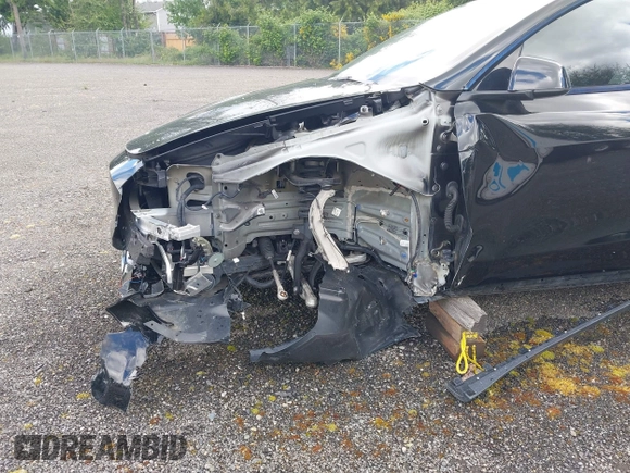 2023 Tesla Model Y Long Range z VIN 7SAYGDEE2PF885116, wystawiony jako IAAI lot #40091902 z przebiegiem 11 779 mil mil oraz . Historia ofert i sprzedaży dostępna na DreamBid. Obrazek 6.