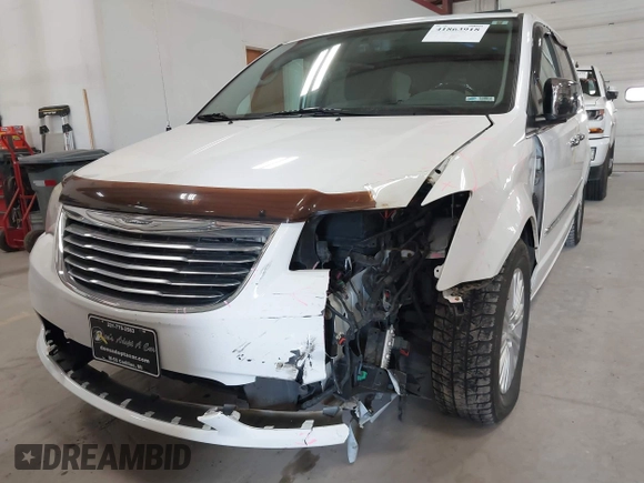 2014 Chrysler Town & Country Limited with VIN 2C4RC1GG7ER178802, listed as a IAAI auction lot 41863918 with 103,777 mi miles and . Bid and sale history available at DreamBid. Image 18.