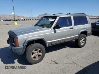 2000 Jeep Cherokee SE with VIN 1J4FF27SXYL140055, listed as a Copart auction lot 70315454 with 176,017 mi miles and Salvage title. Bid and sale history available at DreamBid. Image 1.
