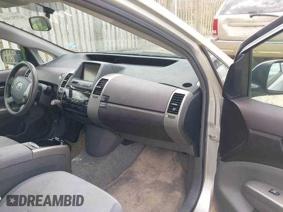 2005 Toyota Prius z VIN JTDKB20U953016544, wystawiony jako IAAI lot #42351340 z przebiegiem 198 989 mil mil oraz . Historia ofert i sprzedaży dostępna na DreamBid. Obrazek 5.