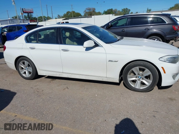 2013 BMW 5 Series 528i with VIN WBAXG5C56DDY31982, listed as a IAAI auction lot 40906428 with 248,336 mi miles and . Bid and sale history available at carsss.com. Image 12.
