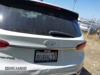 2020 Hyundai Santa Fe SE with VIN 5NMS23AD8LH285363, listed as a IAAI auction lot 42408647 with 60,058 mi miles and . Bid and sale history available at DreamBid. Image 17.