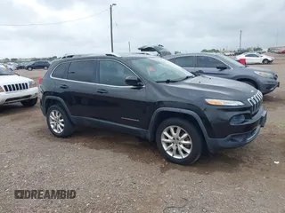 2014 Jeep Cherokee Limited z VIN 1C4PJMDB7EW296945, wystawiony jako IAAI lot #42104377 z przebiegiem 55 253 mil mil oraz . Historia ofert i sprzedaży dostępna na DreamBid. Obrazek 1.