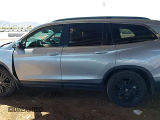 2021 Honda Pilot Special Edition with VIN 5FNYF5H21MB025405, listed as a IAAI auction lot 41857515 with Not Provided miles and . Bid and sale history available at carsss.com. Image 14.