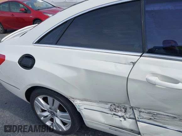 2012 Mercedes-Benz E 350 with VIN WDDKJ5KBXCF133020, listed as a IAAI auction lot 41023858 with 144,330 mi miles and . Bid and sale history available at DreamBid. Image 8.
