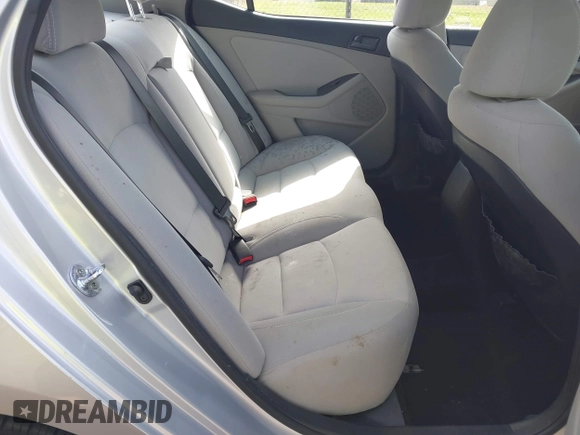 2013 Kia Optima LX z VIN 5XXGM4A72DG177062, wystawiony jako IAAI lot #42129883 z przebiegiem 144 097 mil mil oraz . Historia ofert i sprzedaży dostępna na DreamBid. Obrazek 8.