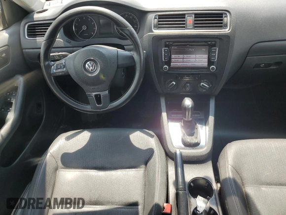 2012 Volkswagen Jetta SE with VIN 3VWDX7AJ3CM064030, listed as a Copart auction lot 62994955 with 185,770 mi miles and Salvage title. Bid and sale history available at DreamBid. Image 8.