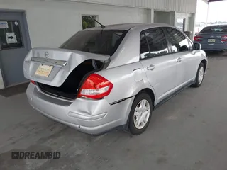 2011 Nissan Versa S with VIN 3N1BC1APXBL460003, listed as a IAAI auction lot 42206242 with 113,099 mi miles and . Bid and sale history available at DreamBid. Image 4.