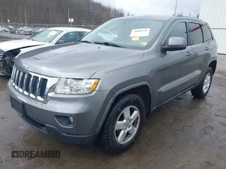 2012 Jeep Grand Cherokee Laredo with VIN 1C4RJFAGXCC118823, listed as a IAAI auction lot 41808398 with 153,509 mi miles. Bid and sale history available at carsss.com. Image 2.