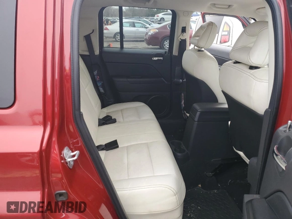 2009 Jeep Patriot Sport z VIN 1J4FT28A39D154793, wystawiony jako Copart lot #89262055 z przebiegiem 92 352 mil mil oraz Szkoda całkowita • Salvage title. Historia ofert i sprzedaży dostępna na DreamBid. Obrazek 11.