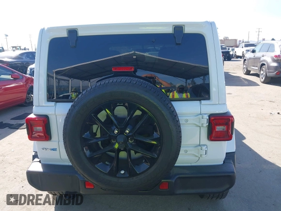 2021 Jeep Wrangler Unlimited Sahara z VIN 1C4JJXP6XMW765398, wystawiony jako IAAI lot #41592185 z przebiegiem 26 834 mil mil oraz . Historia ofert i sprzedaży dostępna na DreamBid. Obrazek 16.