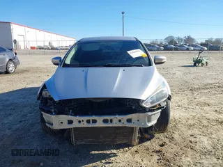 2016 Ford Focus SE with VIN 1FADP3F27GL390830, listed as a IAAI auction lot 41665012 with 119,673 mi miles. Bid and sale history available at carsss.com. Image 6.