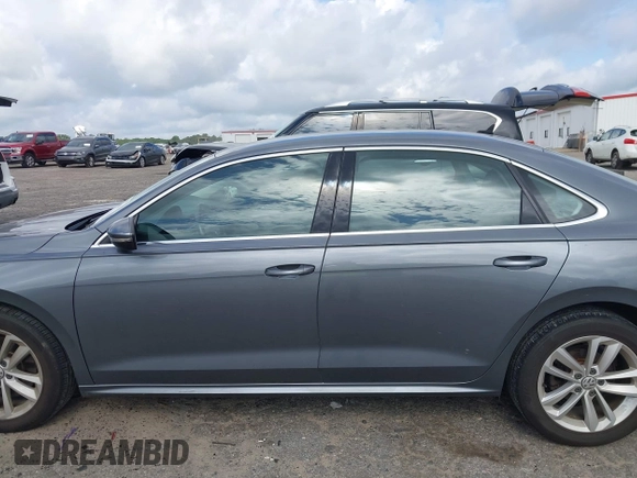 2020 Volkswagen Passat SE with VIN 1VWSA7A37LC022116, listed as a IAAI auction lot 42727604 with 97,271 mi miles and . Bid and sale history available at DreamBid. Image 14.
