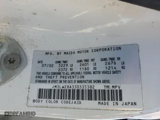 2003 Mazda MPV LX with VIN JM3LW28A330335382, listed as a Copart auction lot 74640944 with 209,833 mi miles and Salvage Title. Bid and sale history available at carsss.com. Image 14.