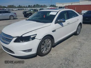 2011 Ford Taurus Limited with VIN 1FAHP2FW1BG121044, listed as a IAAI auction lot 41864054 with 217,929 mi miles and . Bid and sale history available at carsss.com. Image 2.