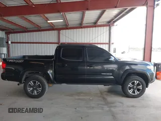 2016 Toyota Tacoma SR with VIN 5TFCZ5AN8GX020900, listed as a IAAI auction lot 41911329 with 133,931 mi miles. Bid and sale history available at carsss.com. Image 13.