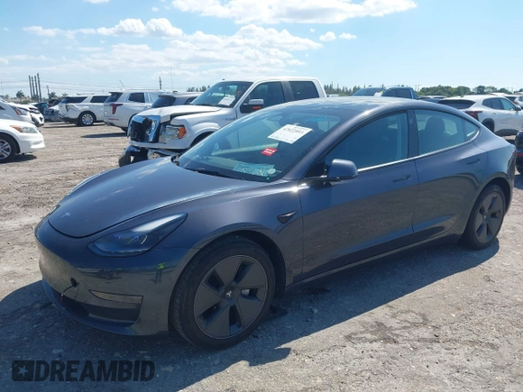 2023 Tesla Model 3 with VIN 5YJ3E1EA8PF626235, listed as a IAAI auction lot 42022893 with 30,333 mi miles and . Bid and sale history available at DreamBid. Image 2.