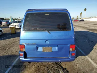 2001 Volkswagen EuroVan MV с VIN WV2NB47061H099148, выставлен на аукционе Copart как лот 77123813 с пробегом Не указан миль и На запчасти • Non repairable. История ставок и продаж доступна на DreamBid. Изображение 6.