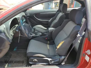 1995 Toyota Celica ST z VIN JT2AT00N7S0042443, wystawiony jako Copart lot #56394475 z przebiegiem 328 515 mil mil oraz Szkody całkowita. Historia ofert i sprzedaży dostępna na DreamBid. Obrazek 7.
