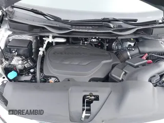 2022 Honda Odyssey EX-L with VIN 5FNRL6H77NB041754, listed as a IAAI auction lot 41791425 with 15,306 mi miles and . Bid and sale history available at DreamBid. Image 10.