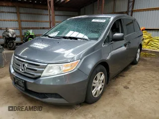 2011 Honda Odyssey LX with VIN 5FNRL5H24BB508865, listed as a Copart auction lot 59715515 with 222,089 mi miles and Salvage title. Bid and sale history available at DreamBid. Image 1.