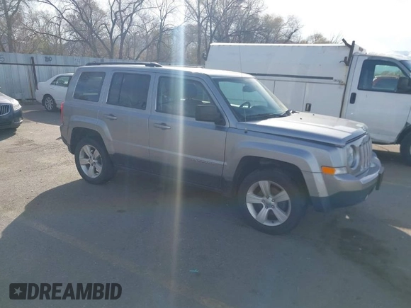 2016 Jeep Patriot High Altitude Edition with VIN 1C4NJRFB1GD712715, listed as a IAAI auction lot 41984245 with 124,227 mi miles. Bid and sale history available at carsss.com. Image 1.