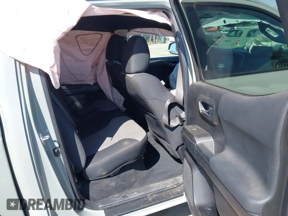 2022 Toyota Tacoma SR with VIN 3TMCZ5AN0NM489420, listed as a IAAI auction lot 42597175 with 129,340 mi miles and . Bid and sale history available at DreamBid. Image 8.
