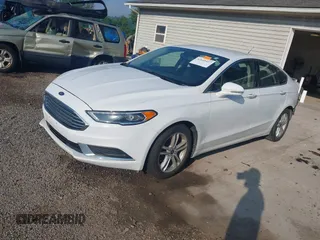 2018 Ford Fusion SE with VIN 3FA6P0HDXJR135927, listed as a IAAI auction lot 42645427 with 107,756 mi miles and . Bid and sale history available at DreamBid. Image 2.