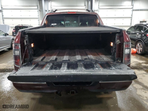 2010 Honda Ridgeline RTL with VIN 5FPYK1F59AB002068, listed as a Copart auction lot 45353325 with 157,260 mi miles and Salvage Title. Bid and sale history available at carsss.com. Image 6.