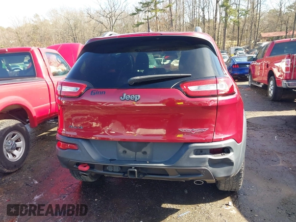 2014 Jeep Cherokee Trailhawk with VIN 1C4PJMBS0EW257133, listed as a IAAI auction lot 41446095 with 82,285 mi miles and . Bid and sale history available at DreamBid. Image 16.