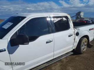 2015 Ford F-150 XLT with VIN 1FTEW1EF8FKE35305, listed as a IAAI auction lot 41679383 with 153,901 mi miles. Bid and sale history available at carsss.com. Image 6.