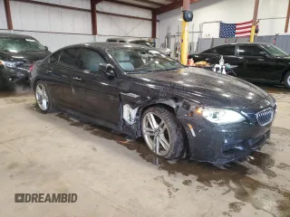 2015 BMW 6 Series 640i xDrive z VIN WBA6B8C58FD453159, wystawiony jako Copart lot #88931285 z przebiegiem 145 656 mil mil oraz Szkoda całkowita • Salvage title. Historia ofert i sprzedaży dostępna na DreamBid. Obrazek 4.
