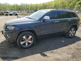 2014 Jeep Grand Cherokee Overland with VIN 1C4RJFCT1EC379867, listed as a Copart auction lot 54106375 with 217,908 mi miles and Clean Title. Bid and sale history available at carsss.com. Image 1.