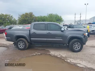 2018 Toyota Tacoma SR5 with VIN 5TFAZ5CN5JX062498, listed as a IAAI auction lot 41867393 with 128,879 mi miles and . Bid and sale history available at DreamBid. Image 14.