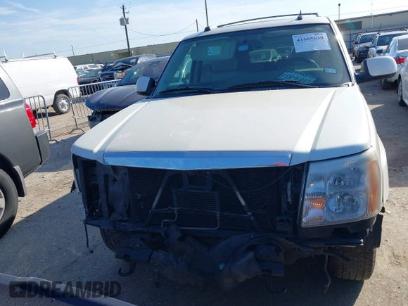 2005 Cadillac Escalade z VIN 1GYEC63TX5R114526, wystawiony jako IAAI lot #41685638 z przebiegiem 167 048 mil mil oraz . Historia ofert i sprzedaży dostępna na DreamBid. Obrazek 6.