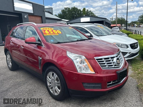 2015 Cadillac SRX Luxury Collection z VIN 3GYFNBE37FS569840, wystawiony jako Copart lot #52823025 z przebiegiem 183 816 mil mil oraz Czysty tytuł • Clean title. Historia ofert i sprzedaży dostępna na DreamBid. Obrazek 1.