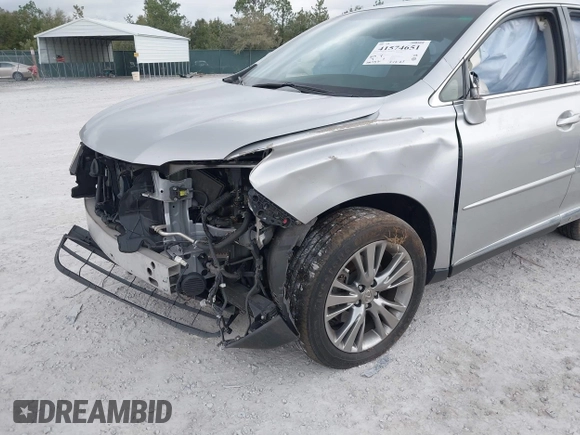 2013 Lexus RX 450h with VIN JTJZB1BA8D2008237, listed as a IAAI auction lot 41574651 with 106,732 mi miles and . Bid and sale history available at DreamBid. Image 18.